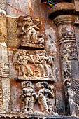 The great Chola temples of Tamil Nadu - The Airavatesvara temple of Darasuram. Panel with attendant figures flanking the niches on the north wall of the sanctuary. 